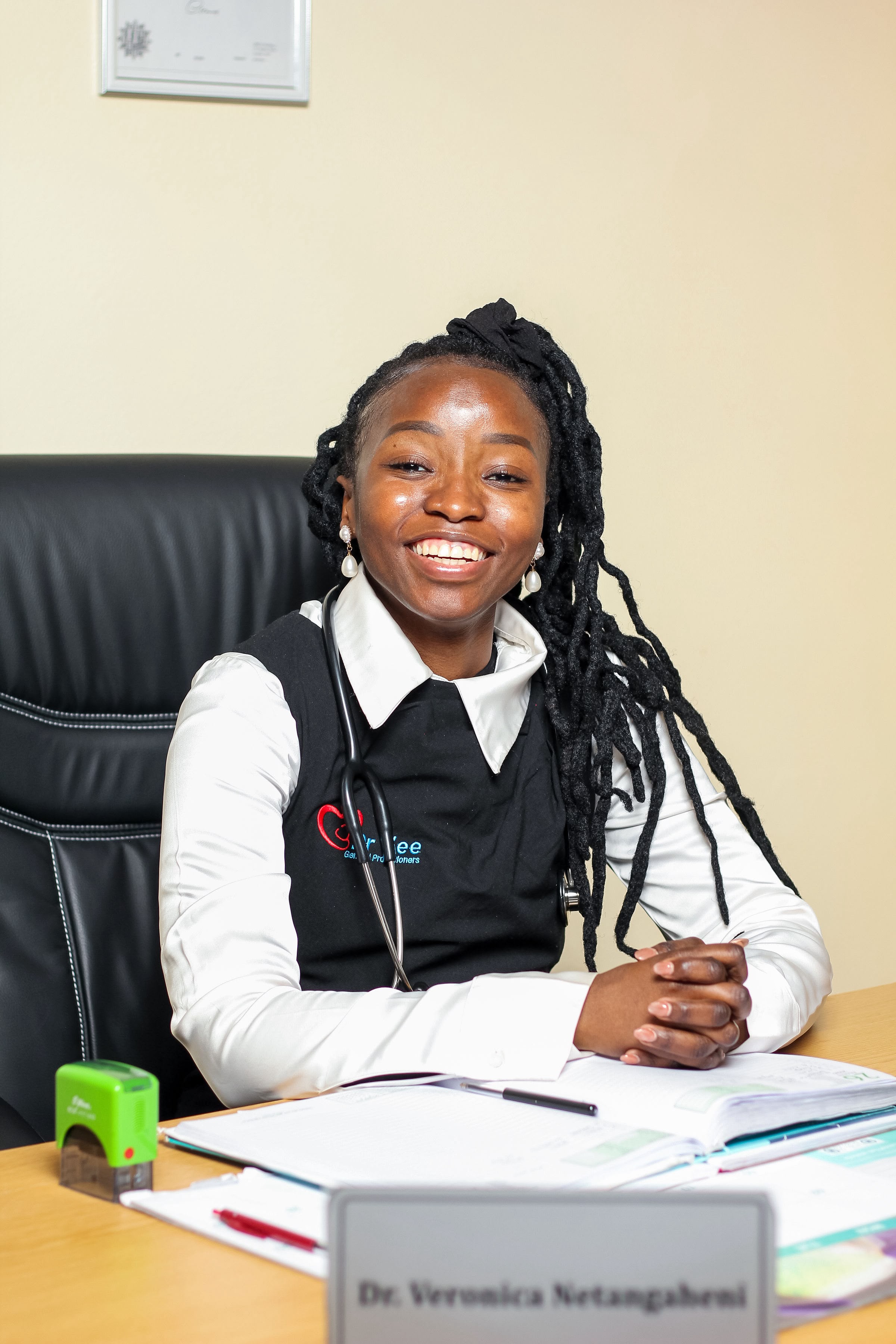 Dr Veronica Netangaheni smiling in a clinical setting